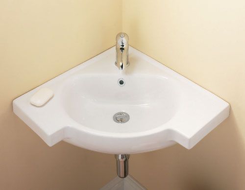 Угловая раковина в ванную: выбор и установка
